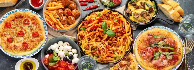 Italian food assortment with pasta, pizza and appetizers